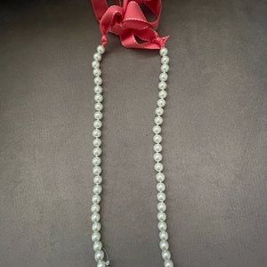 Beautiful faux pearl necklace. 20 inches. New
